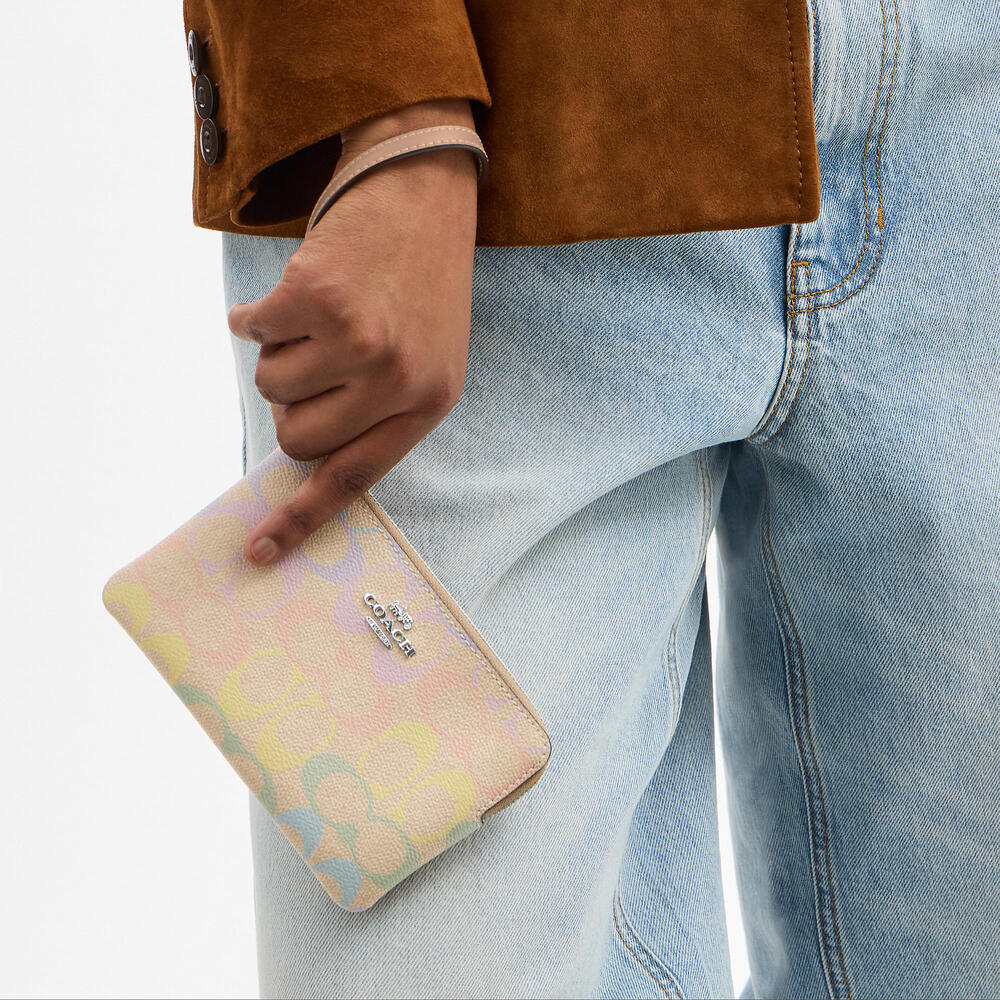 Coach Corner Zip Wristlet In Rainbow Signature Canvas